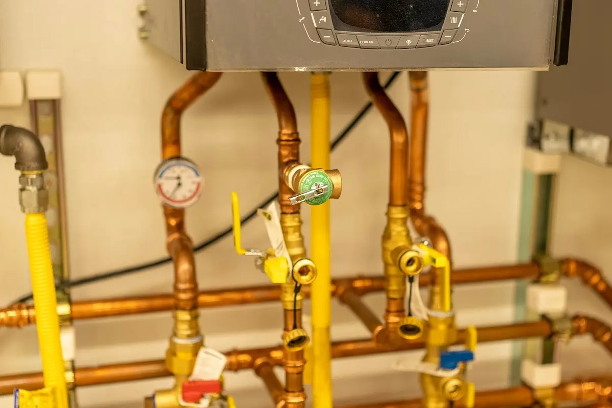 Licensed technician providing Water Heater Installation for a homeowner in Hubbard